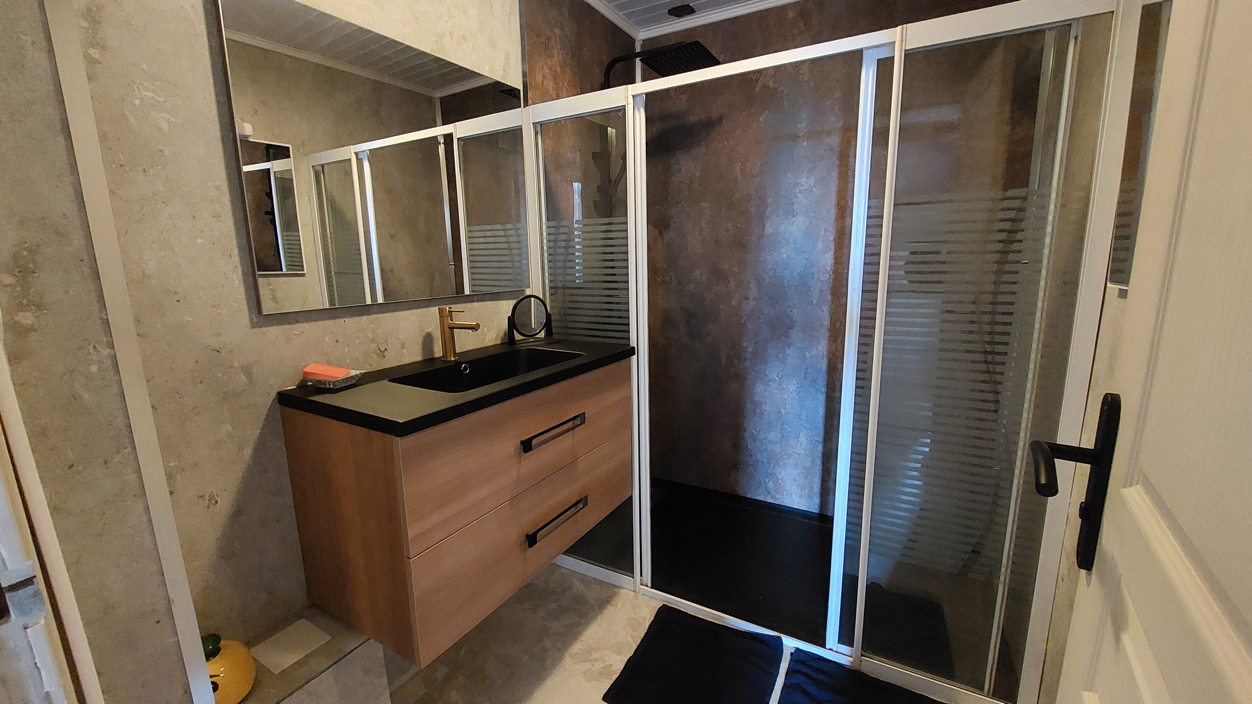 Spacious, modern shower in the gîte bathroom