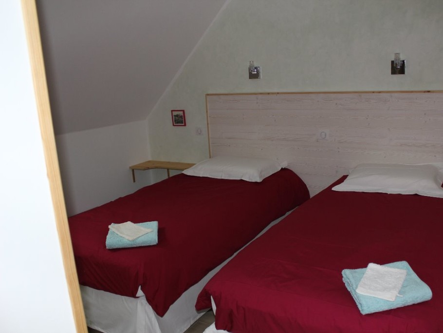 La chambre verte avec 2 lits en 90