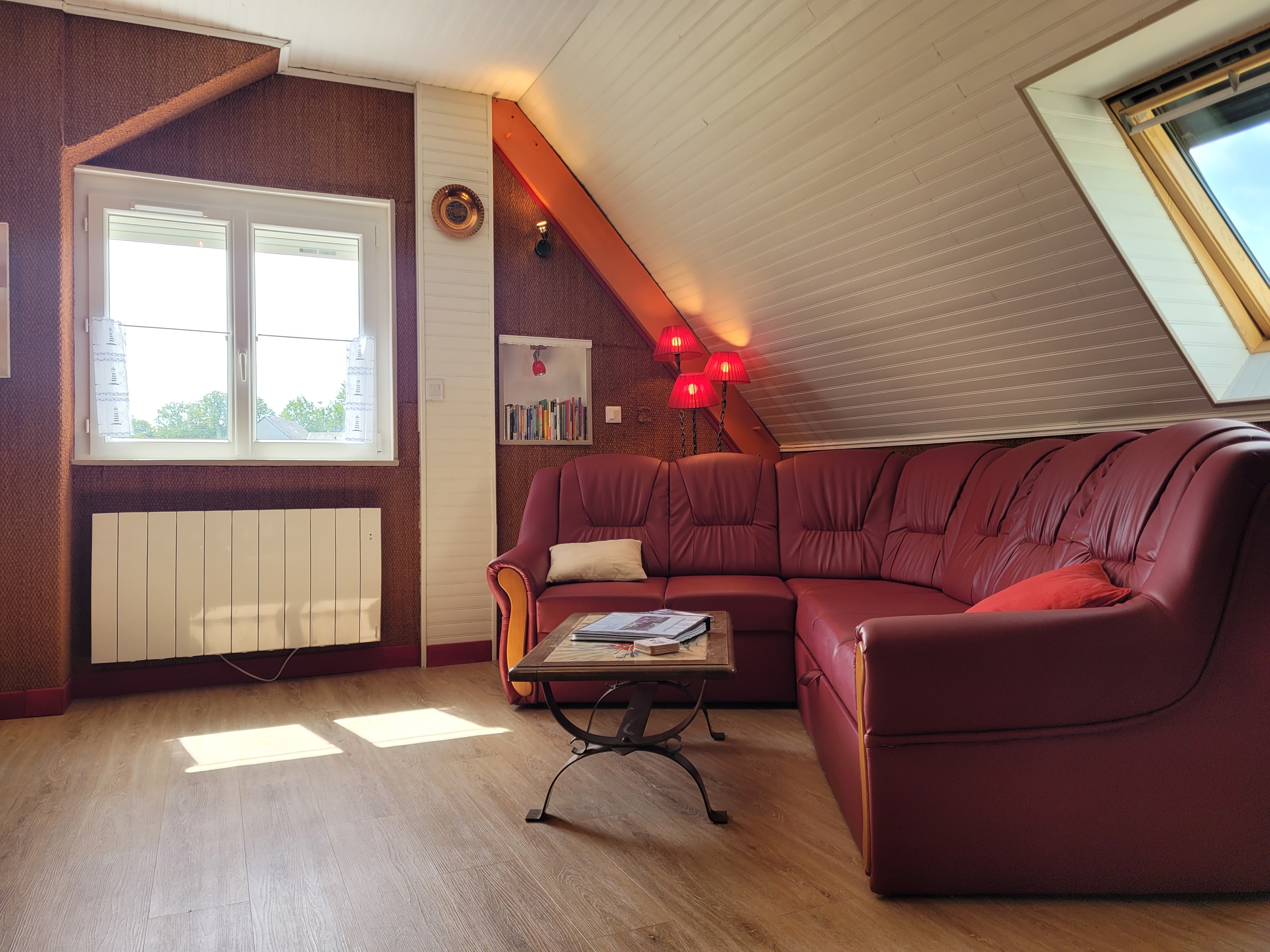 Location de vacances Paimpol, Clévacances, pièce de vie avec salon, table à manger