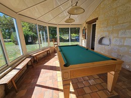 Véranda avec billard