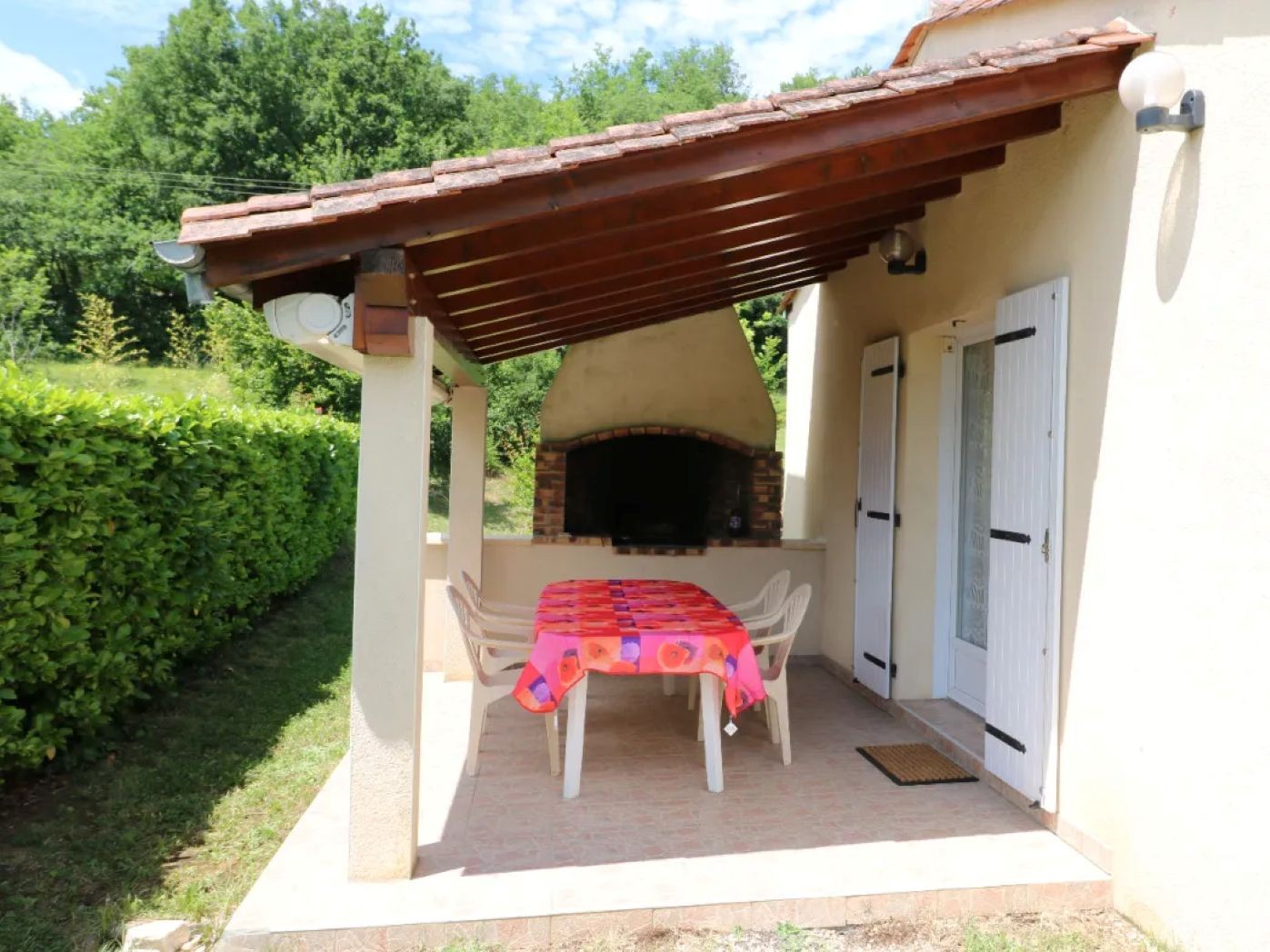 Terrasse couverte plus store