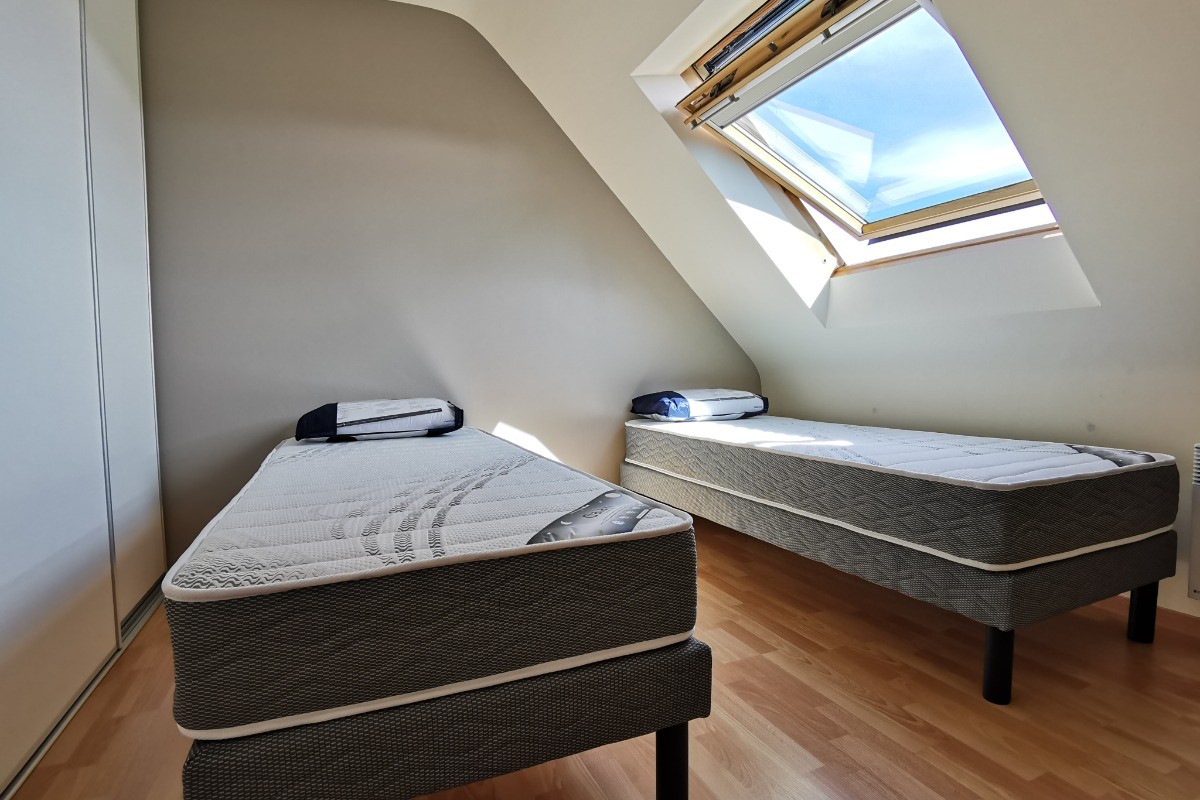 Chambre avec 2 lits 80