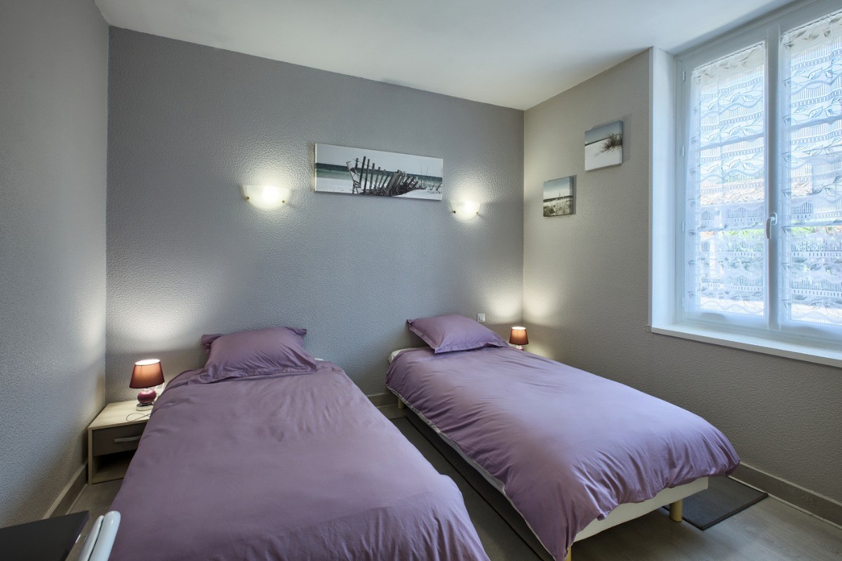 Lits de 90 x 190 que nous pouvons rapprocher pour faire un grand lit