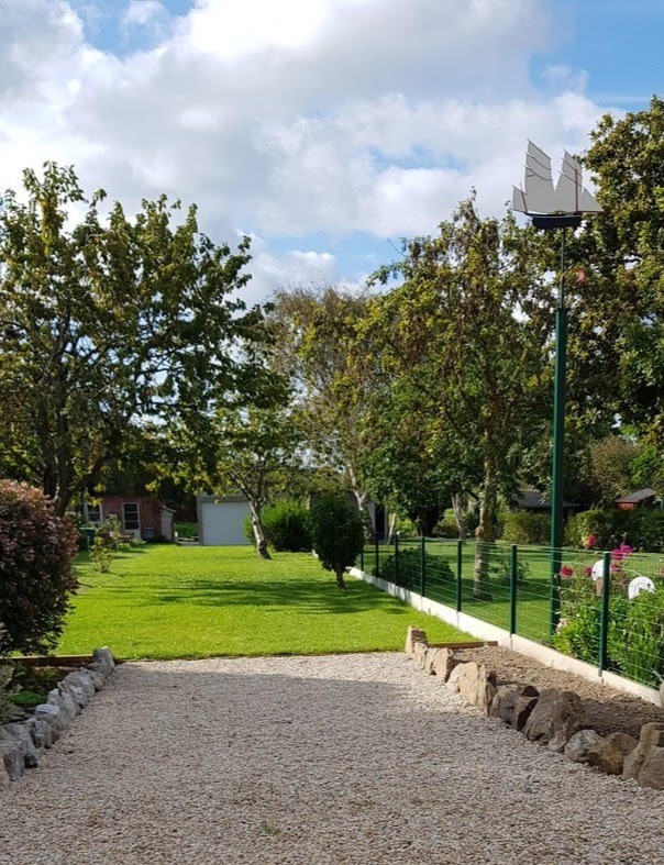 Pleasant long garden with trees