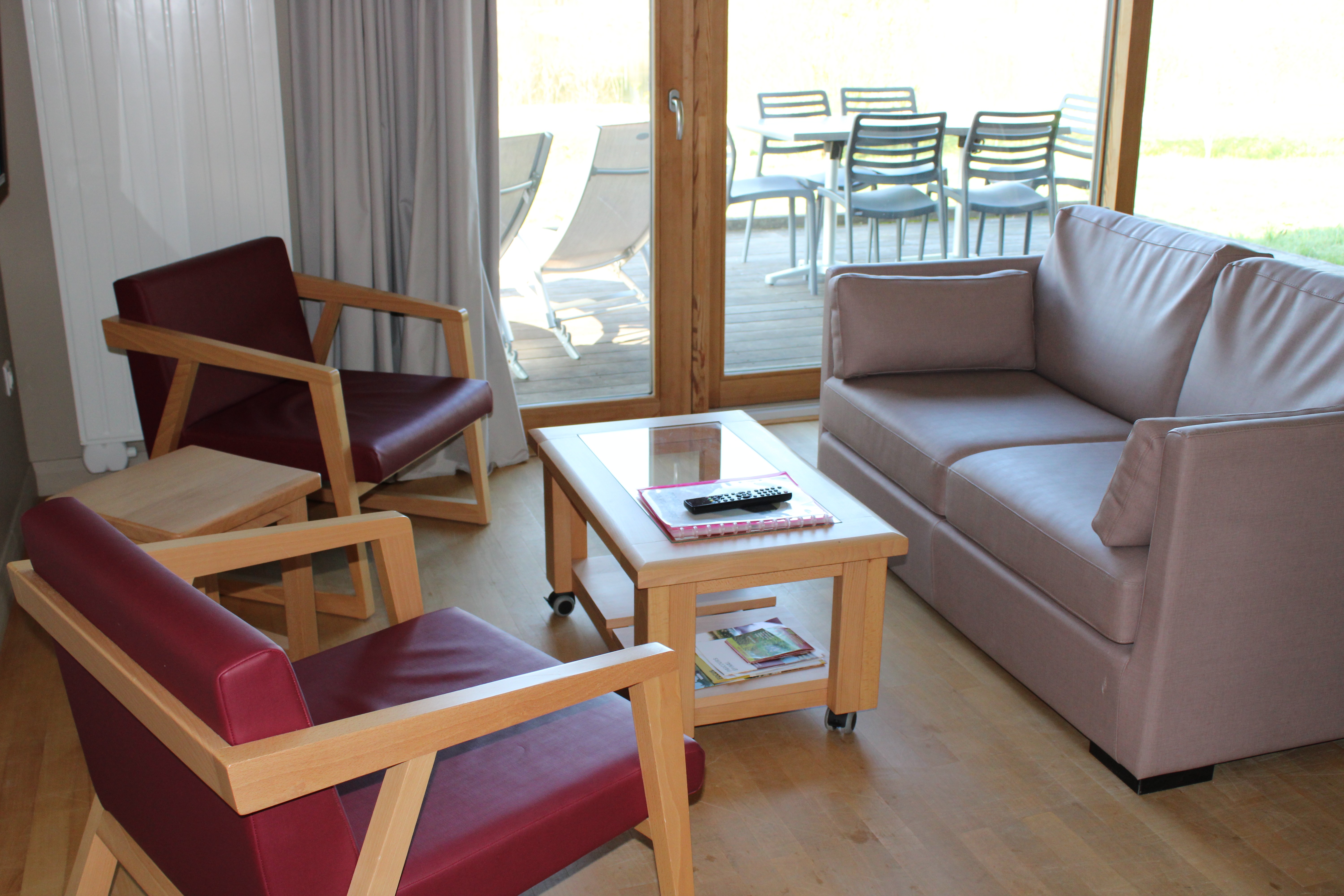 Espace séjour donnant sur la terrasse privative