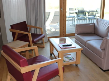 Espace séjour donnant sur la terrasse privative