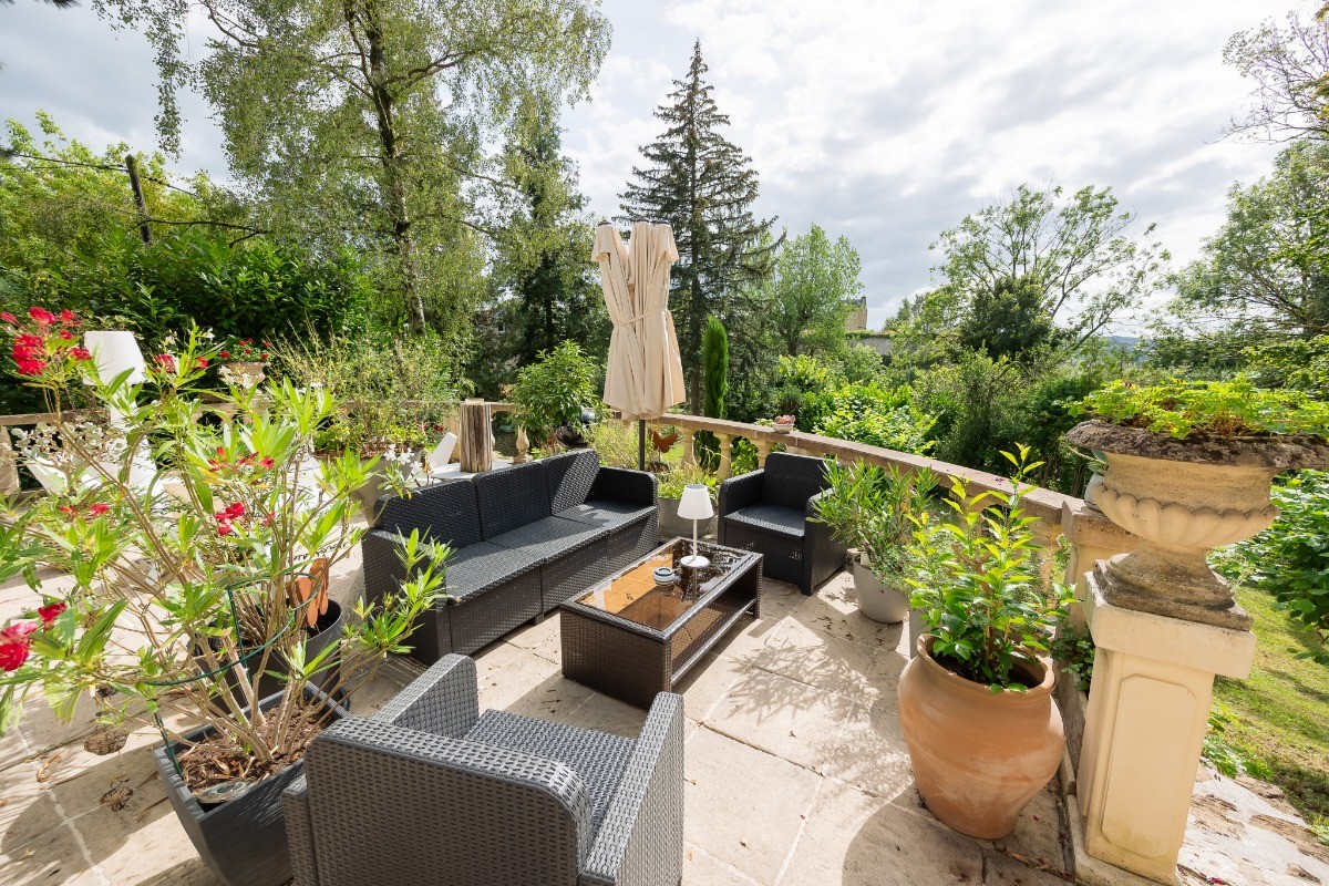Vue sur le jardin - coin salon d'exterieur