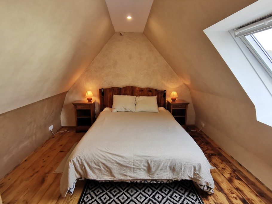 Une seconde chambre avec un lit de 160x200cm
