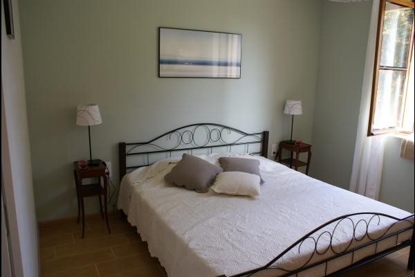 Chambre lit king size 180.