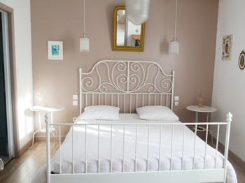 Chambre Lilas avec un lit en 160