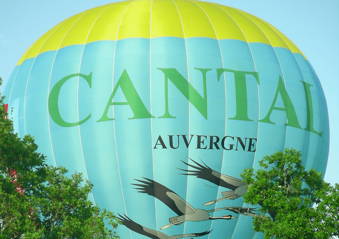 Cantal Auvergne hot-air balloon in the sky, leisure and discovery around the lake