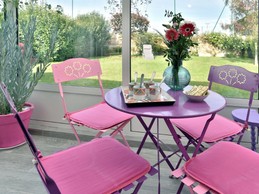 Petite véranda donnant sur le jardin