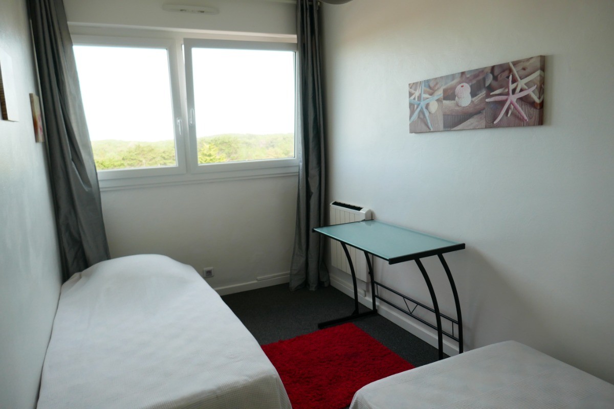 Chambre avec 2 lits en 90