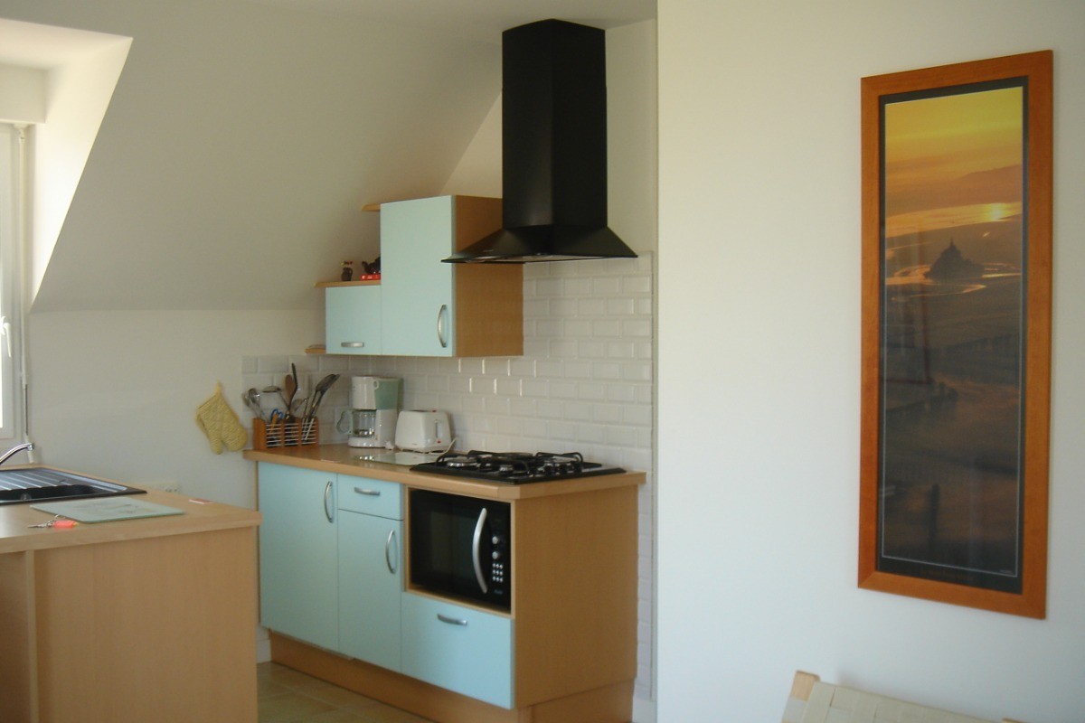 La cuisine toute équipée, Four Micro Ondes, Lave vaisselle, Lave linge.
